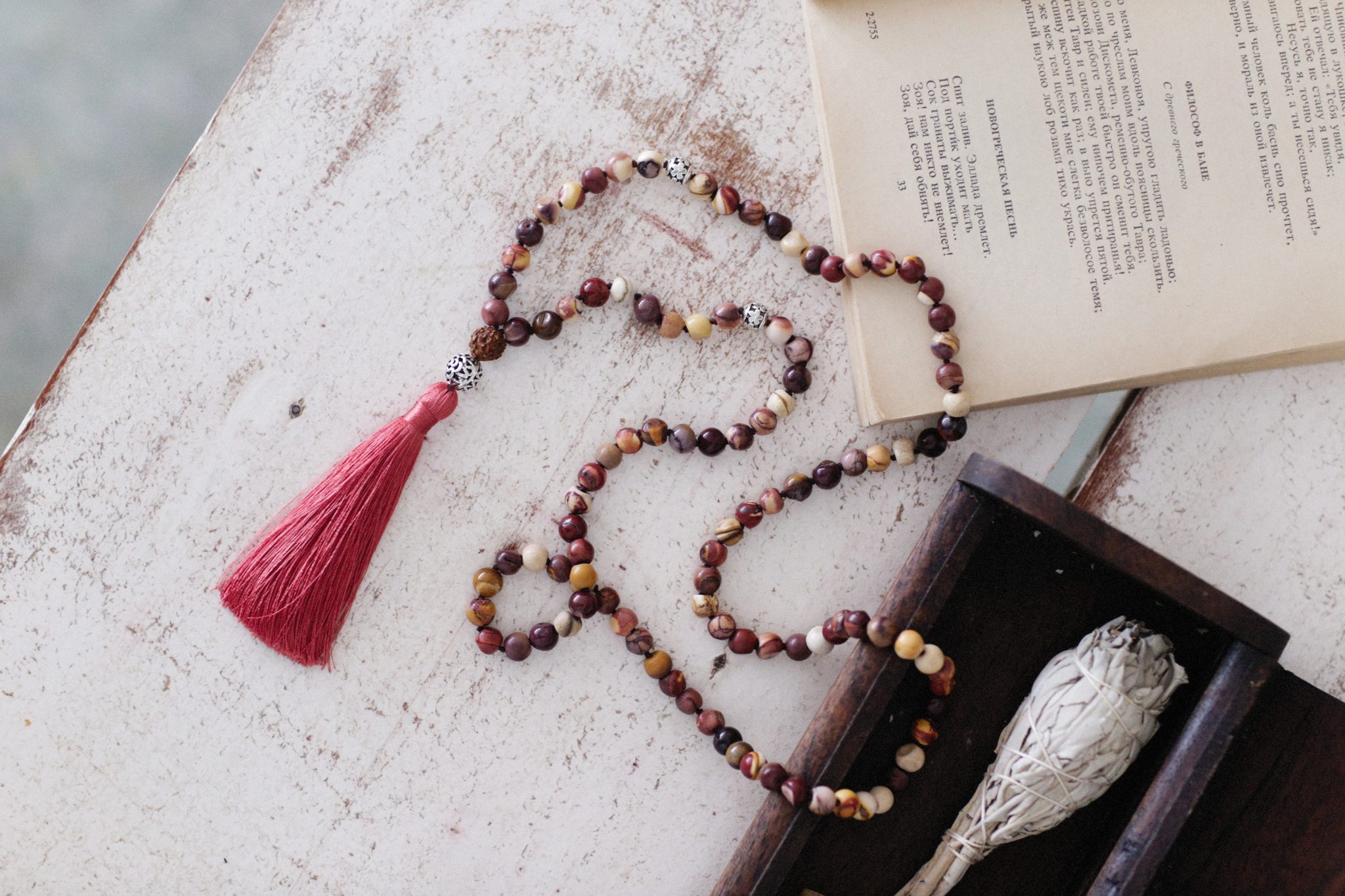 Photo of Misbaha, Islamic prayer beads, with a link that takes you to the Contact Us page to contact the Mosque about funeral services.